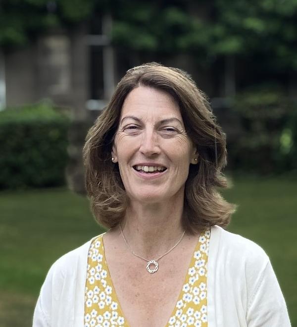 Portrait photo of Beth Breeze in front of HMC Quad