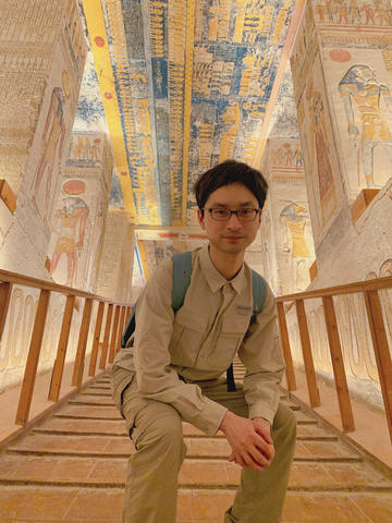 Dr Jordan Miller crouching in the tomb of Ramesses VI, Valley of the Kings, Luxor, Egypt.