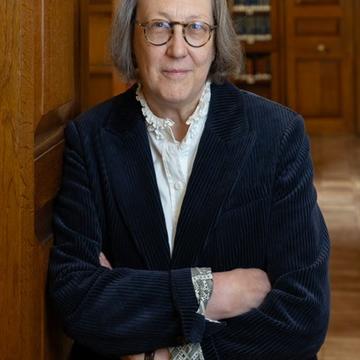 Professor Jane Shaw in a wood-panelled room