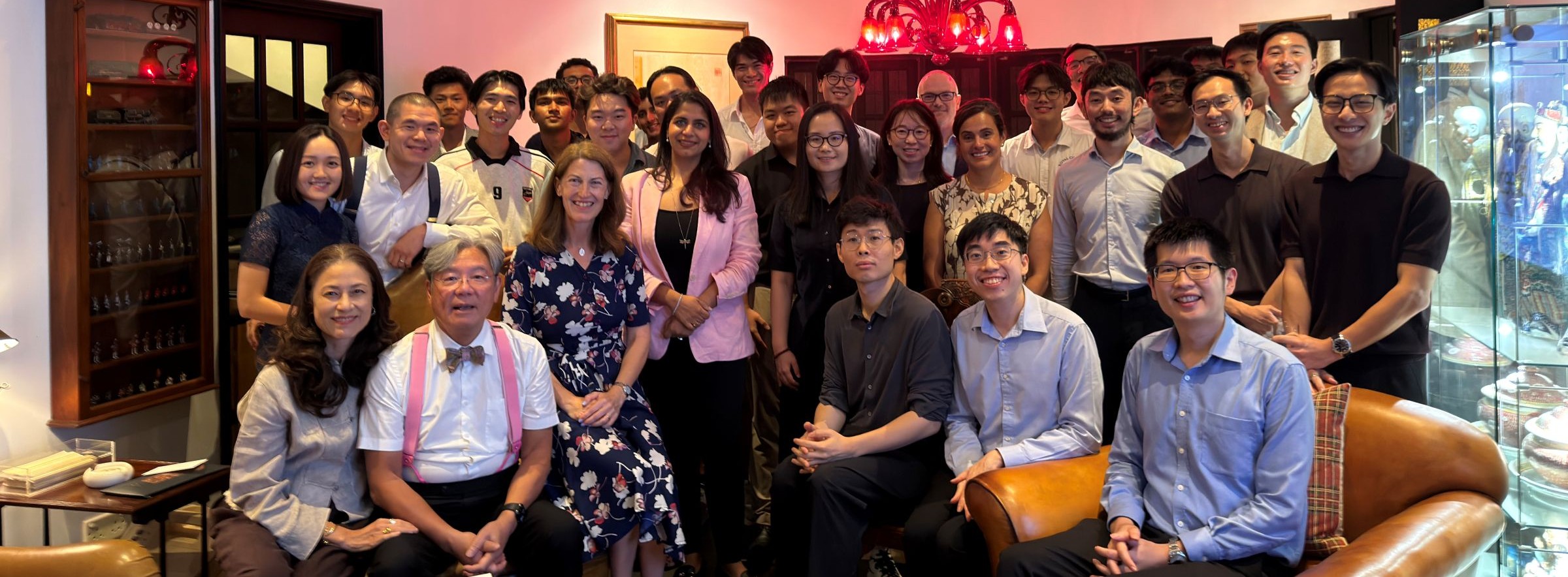 Beth Breeze and Isabel Ruiz with a group of Singapore alumni
