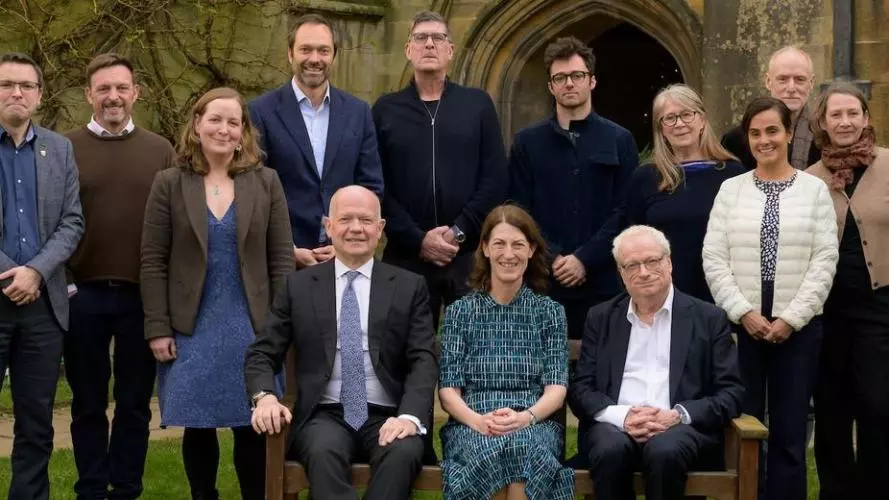 Members of the Governing Body with Oxbridge Chancellors Lord Hague and Lord Smith (either side of Dr Breeze) at the recent Charter Dinner. Dr Sollereder and Professor De Neve are fourth and fifth from left (Image: Edmund Blok)