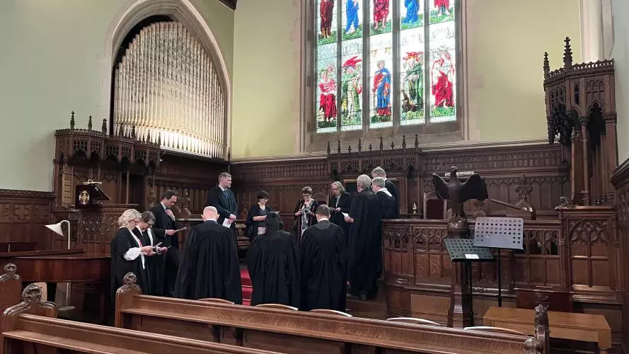 College Fellows and Principal gathered in chapel