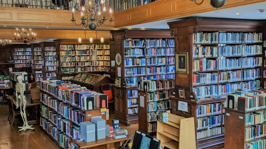 Picture of shelves of books in the Tate Library