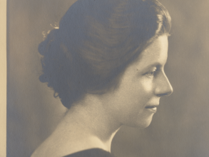 A black and white photograph of Margaret Crook in profile, showing her shoulders and head.  