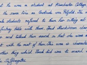 A picture of handwritten letter on lined paper in blue ink.