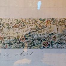 A coloured sketch of some flowers and foliage with the phrase O ye spirits and souls of the righteous bless the Lord in the middle