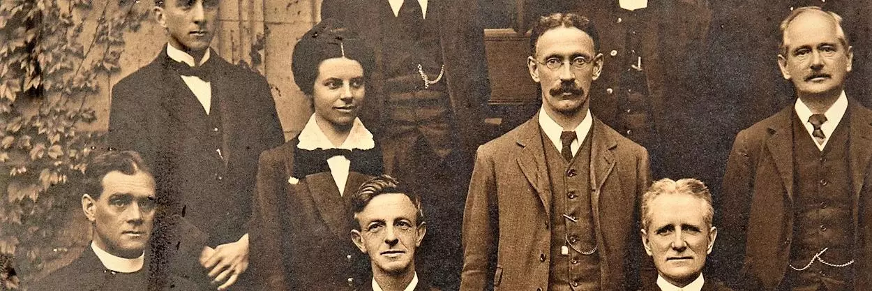 A cropped photograph of a class photo from 1917 showing the students from that year. Margaret Brackenbury Crook in shown amongst her male colleagues.  The photograph is in black and white.